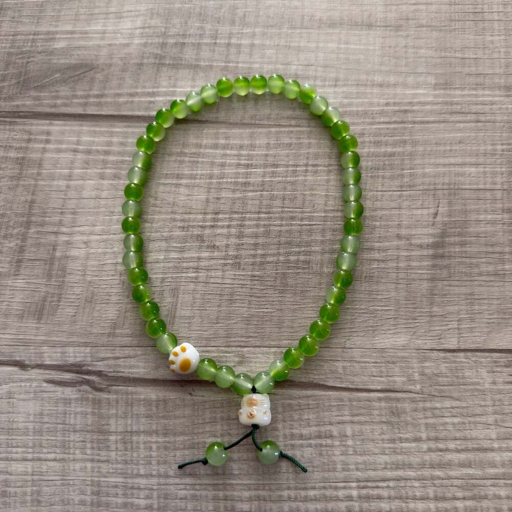 Green Glass Beaded necklace bracelet with Lucky Cat and Paw Charms